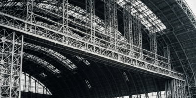 historical airship hangar massive steel structure with small 20260331 094243