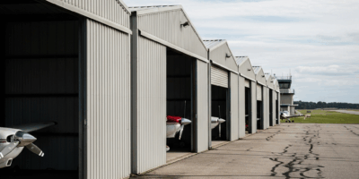 small aircraft T-hangar row at regional airport